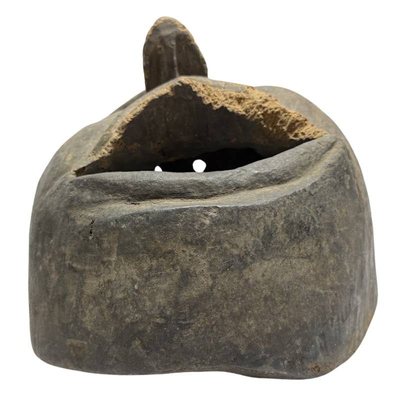African ritual mask of hand-carved wood with an old patina