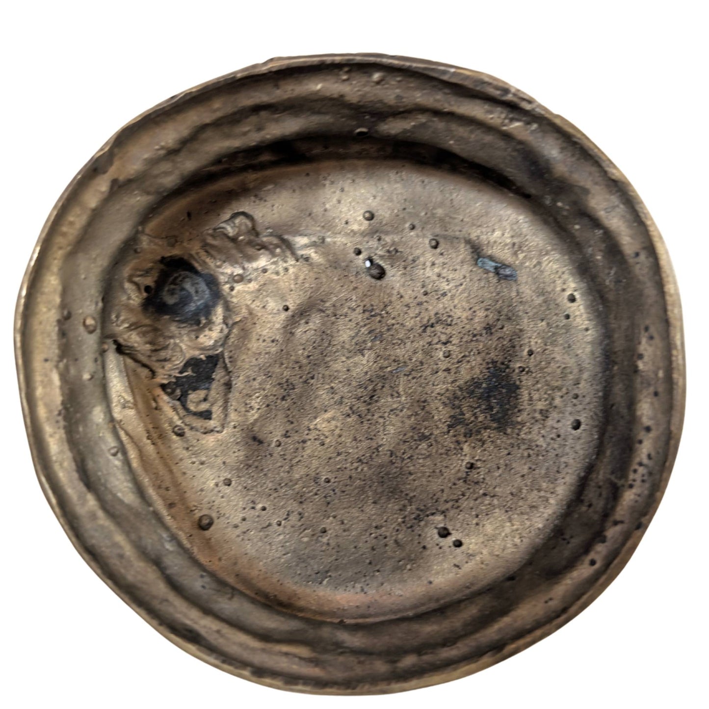 The hollow underside shows the authentic manual casting marks and core remnants.