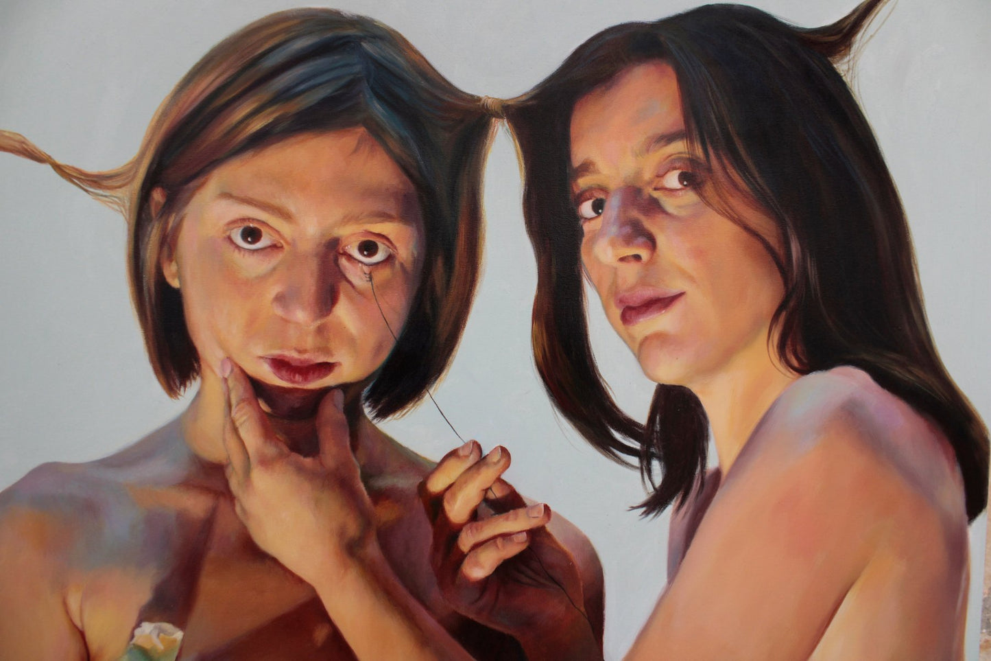painting two naked women intense interaction