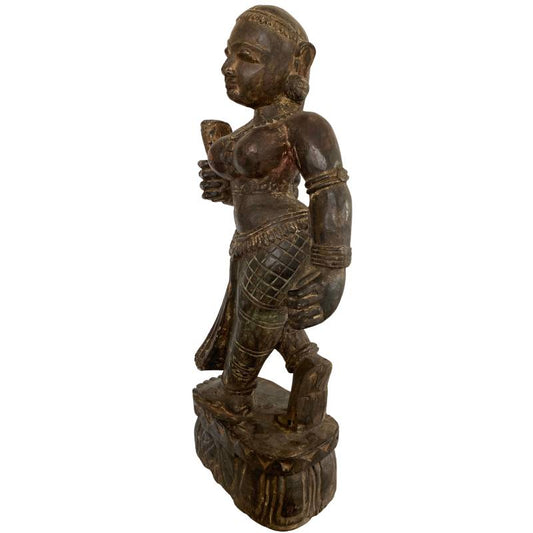 Wooden Lakshmi statue, Nepal, Newar tradition, with visible remnants of old red and black polychromy