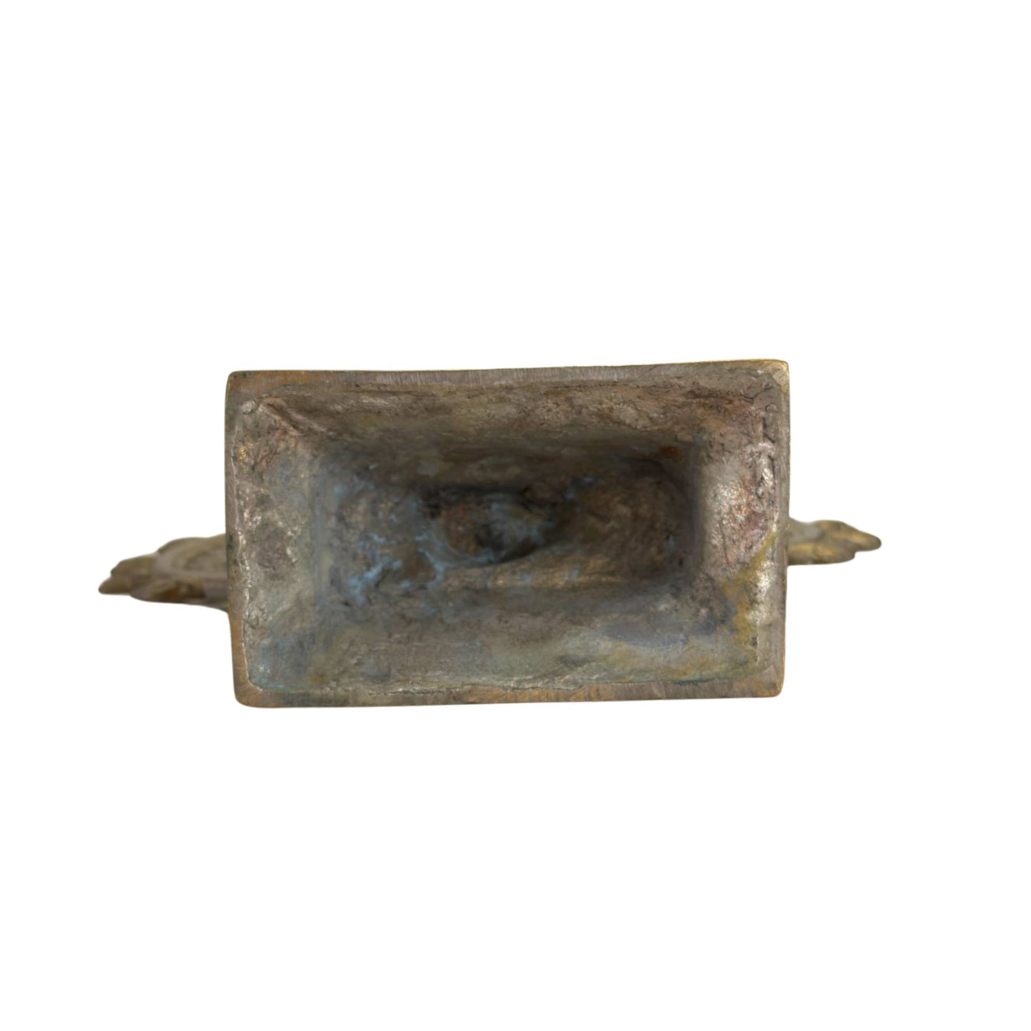 Bottom of an antique bronze Nataraja statue with an old casting structure
