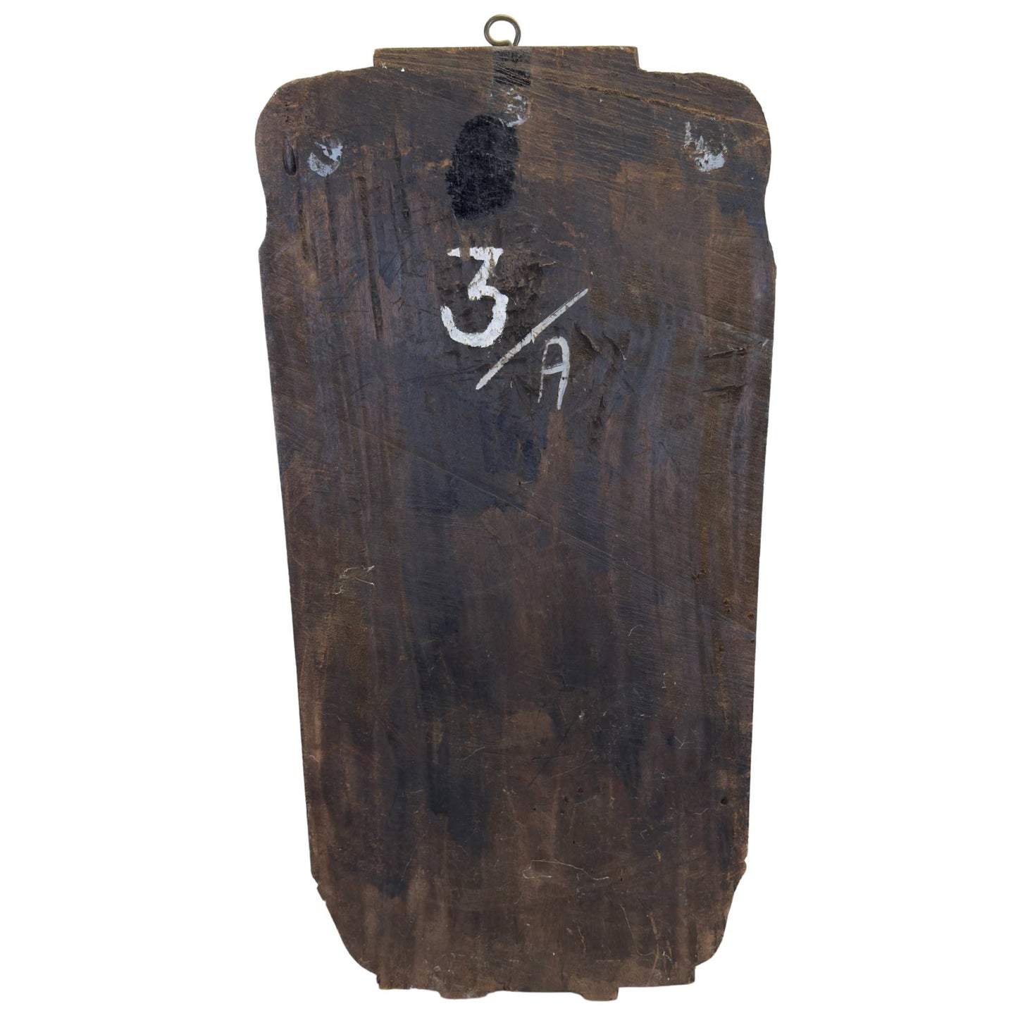 Old patina and wear on a hand-carved Indian wooden panel