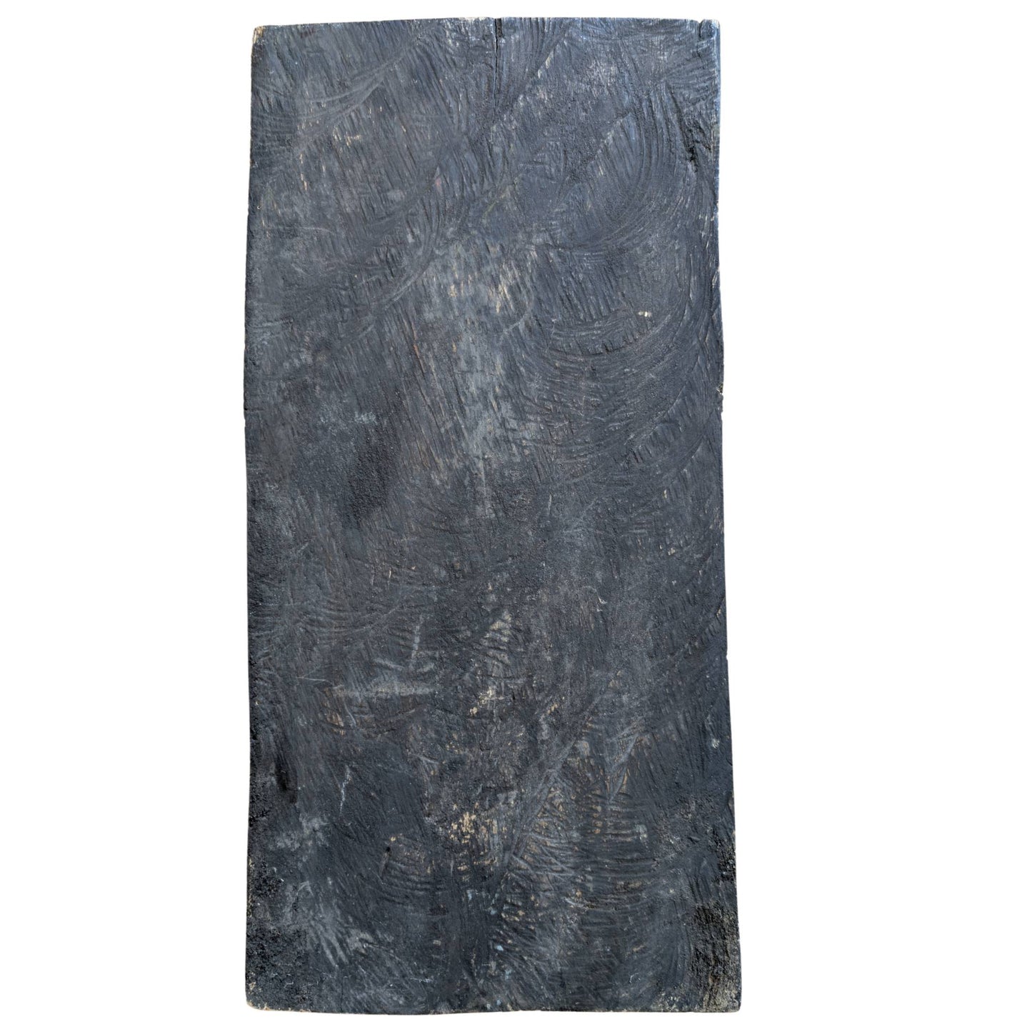 The rough, hand-hewn back of the panel with clear signs of age and erosion.