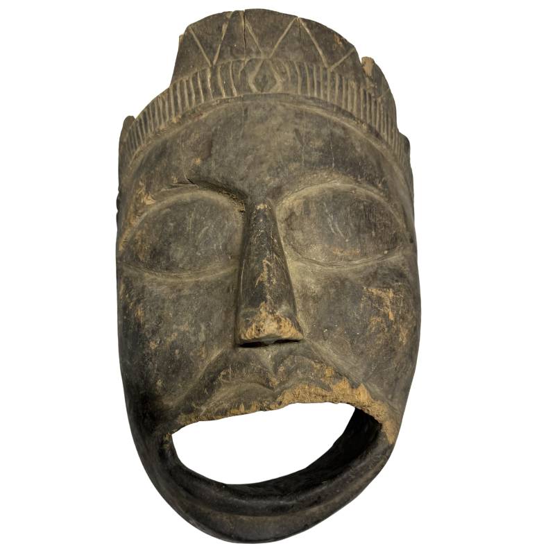 African wooden mask made of carved wood with natural patina