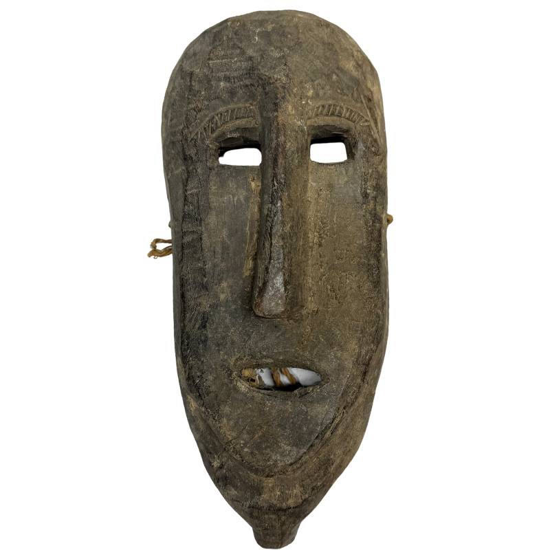 Nepalese wooden ritual mask with shell inlay and natural patina
