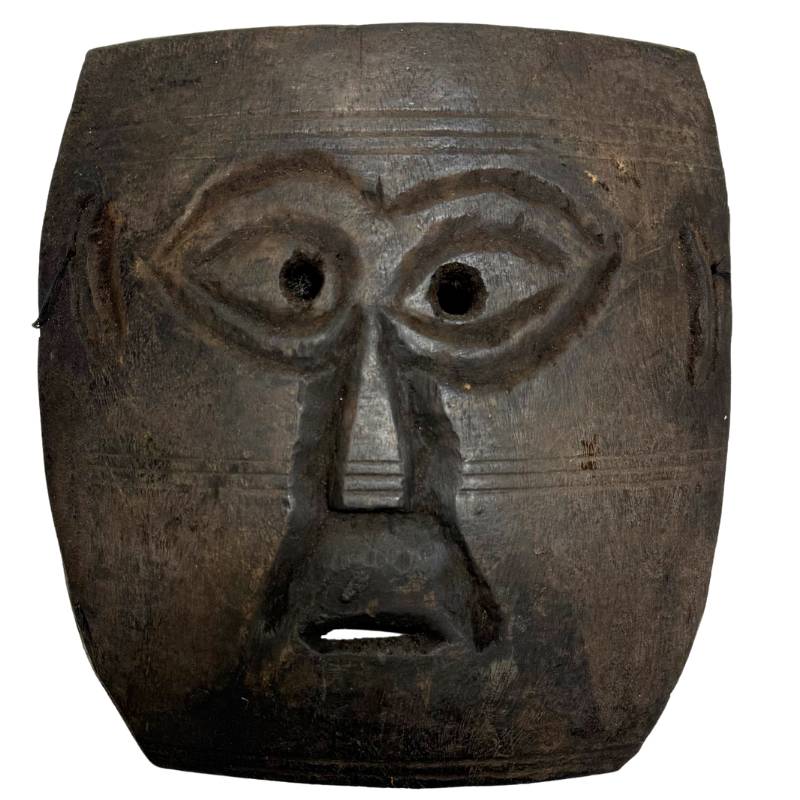 Hand-carved antique wooden Pere mask, 25 cm, from Congo with a brutal sacrificial crust patina and almond-shaped eyes, perfect as exclusive wall art.