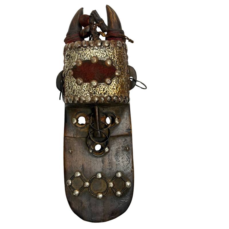 Hand-carved antique wooden Marka mask, 31 cm, with hammered brass fittings and cowrie shells from Mali, perfect as exclusive wall art.