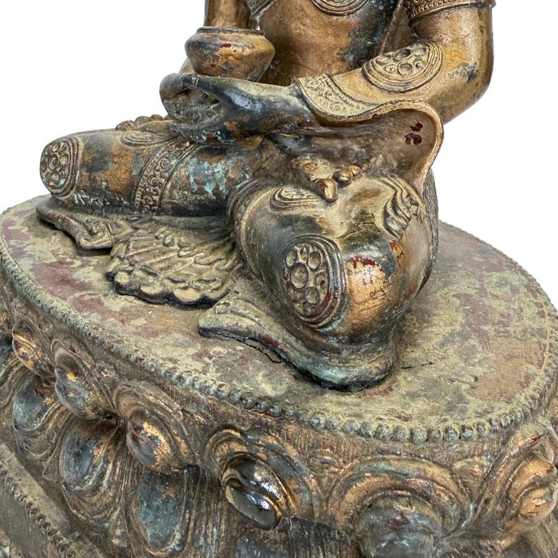 Antique-style Tibetan Medicine Buddha with gold plating