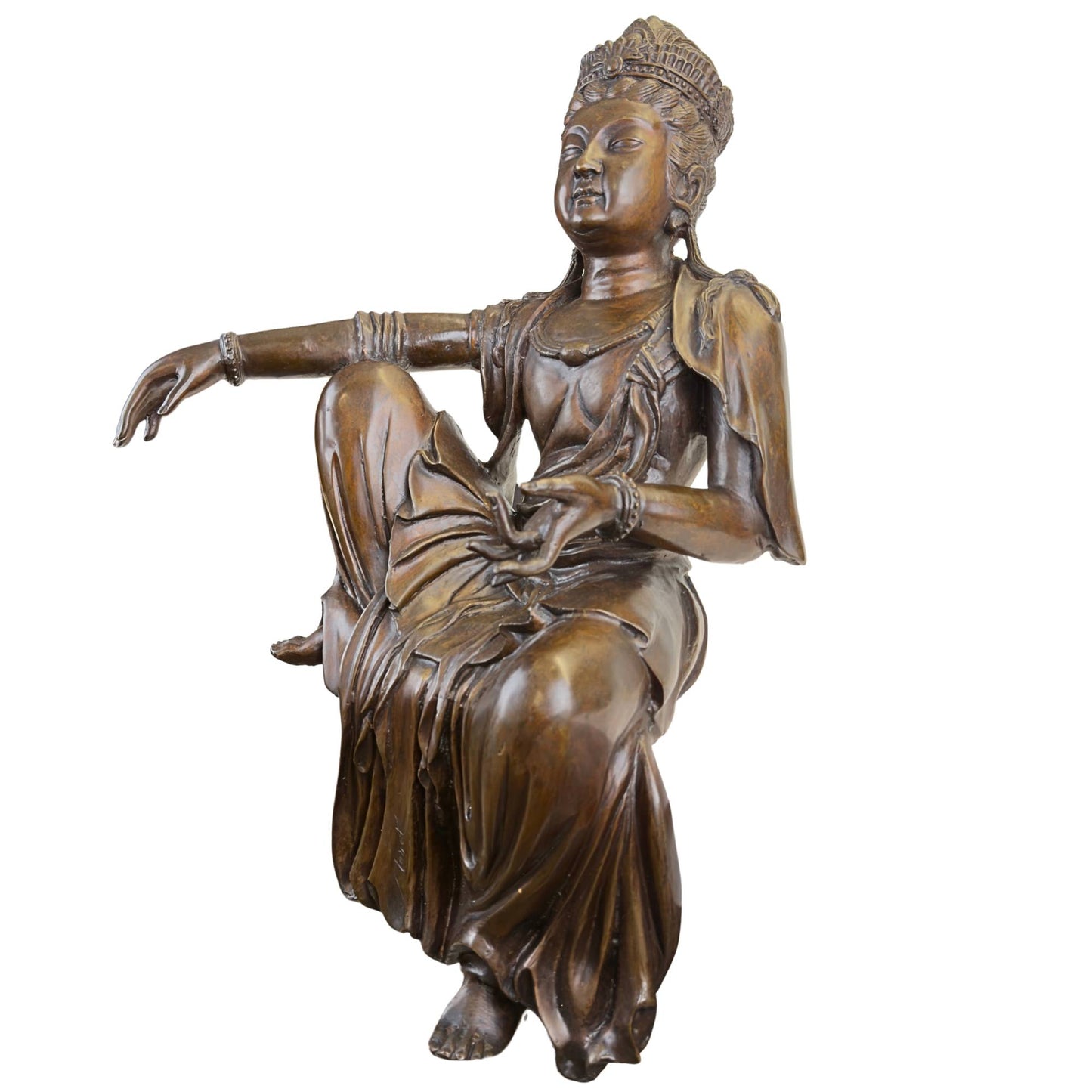 Left side view of the bronze meat resting on a flat surface with the handwritten cast-in signature Monet.