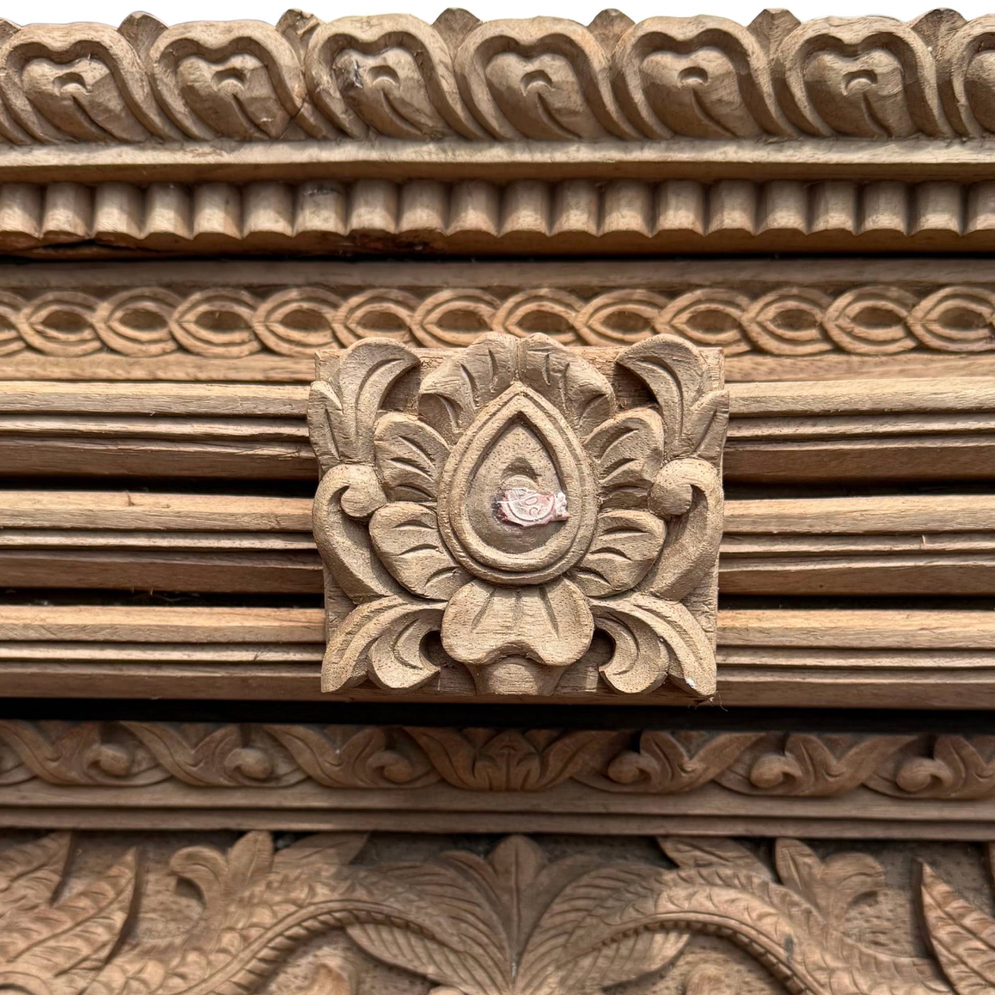 Himalayan woodcarving teak window Buddhist symbolism