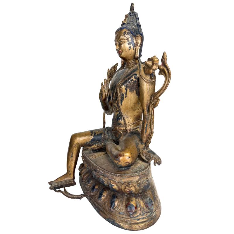 Sino-Tibetan Buddha statue with gold patina