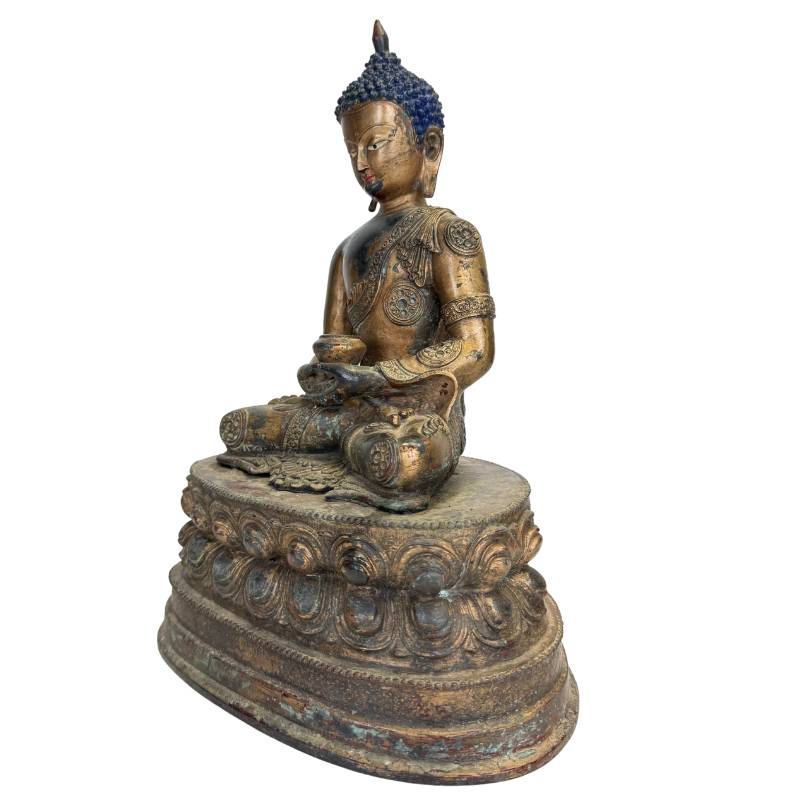 Medicine Buddha sculpture of gilded copper alloy