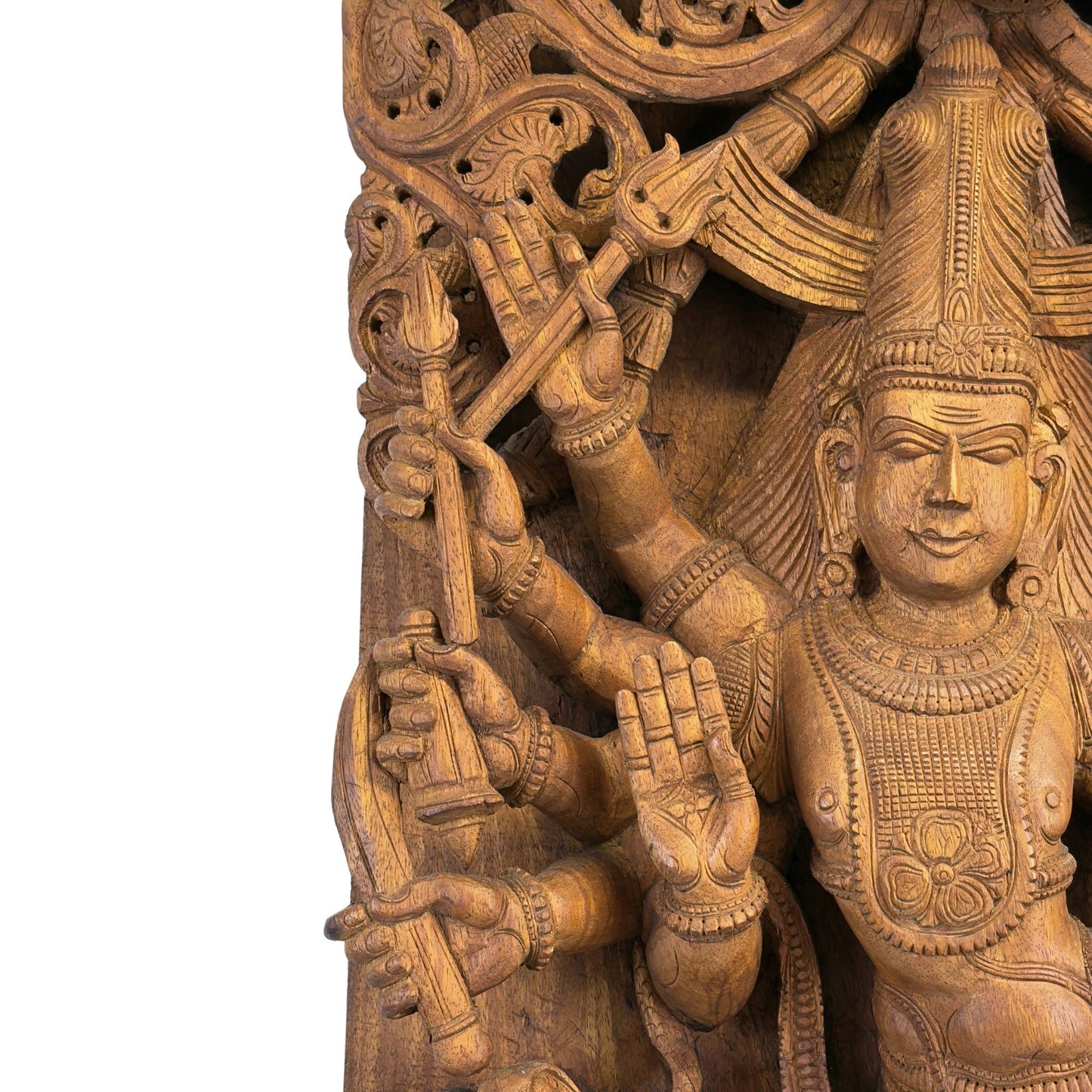 Detail of the right side with the multiple arms of Shiva holding the Trishula trident and forming the Abhaya mudra.