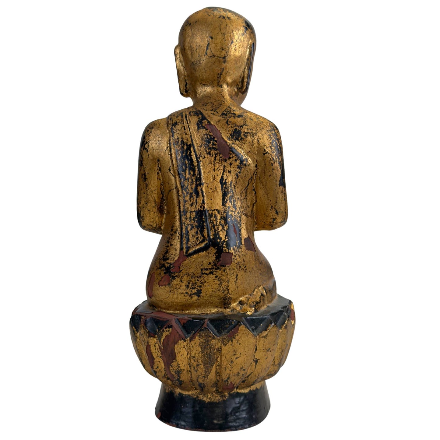 Rear view of the hand-carved 19th-century monk statue