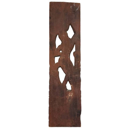 Back of an antique Balinese wood sculpture with historical oxidation and wood grain