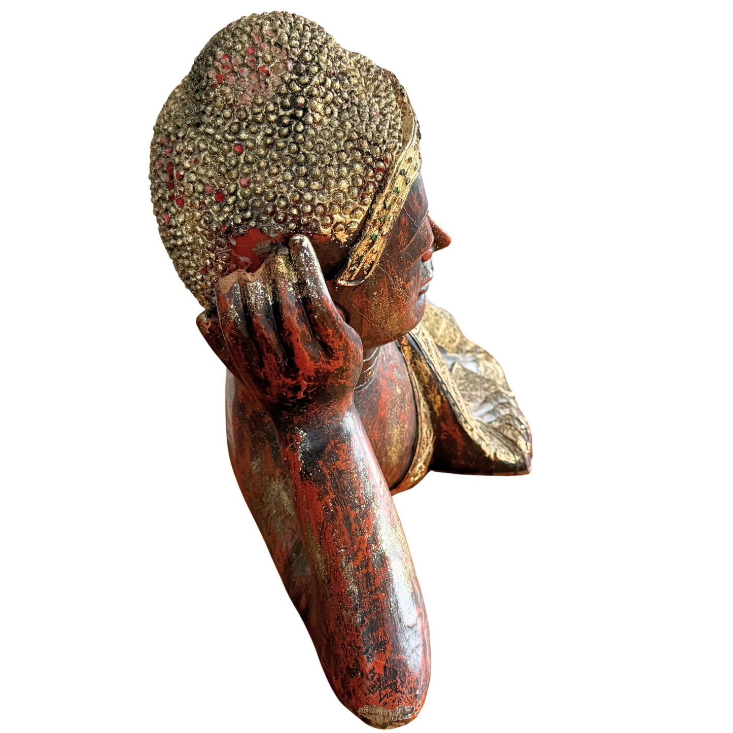 Back of the head of the reclining Buddha with the hand-stitched hair curls