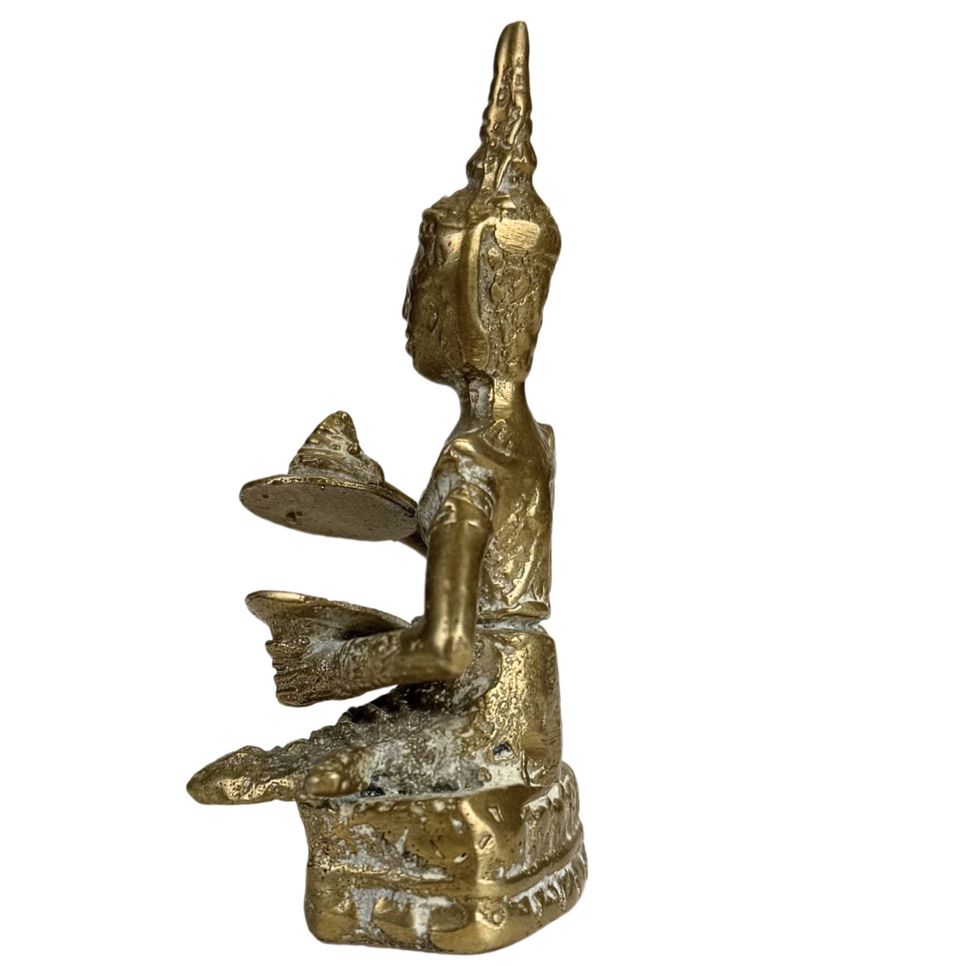 Back of old Thai bronze figurine with signs of wear