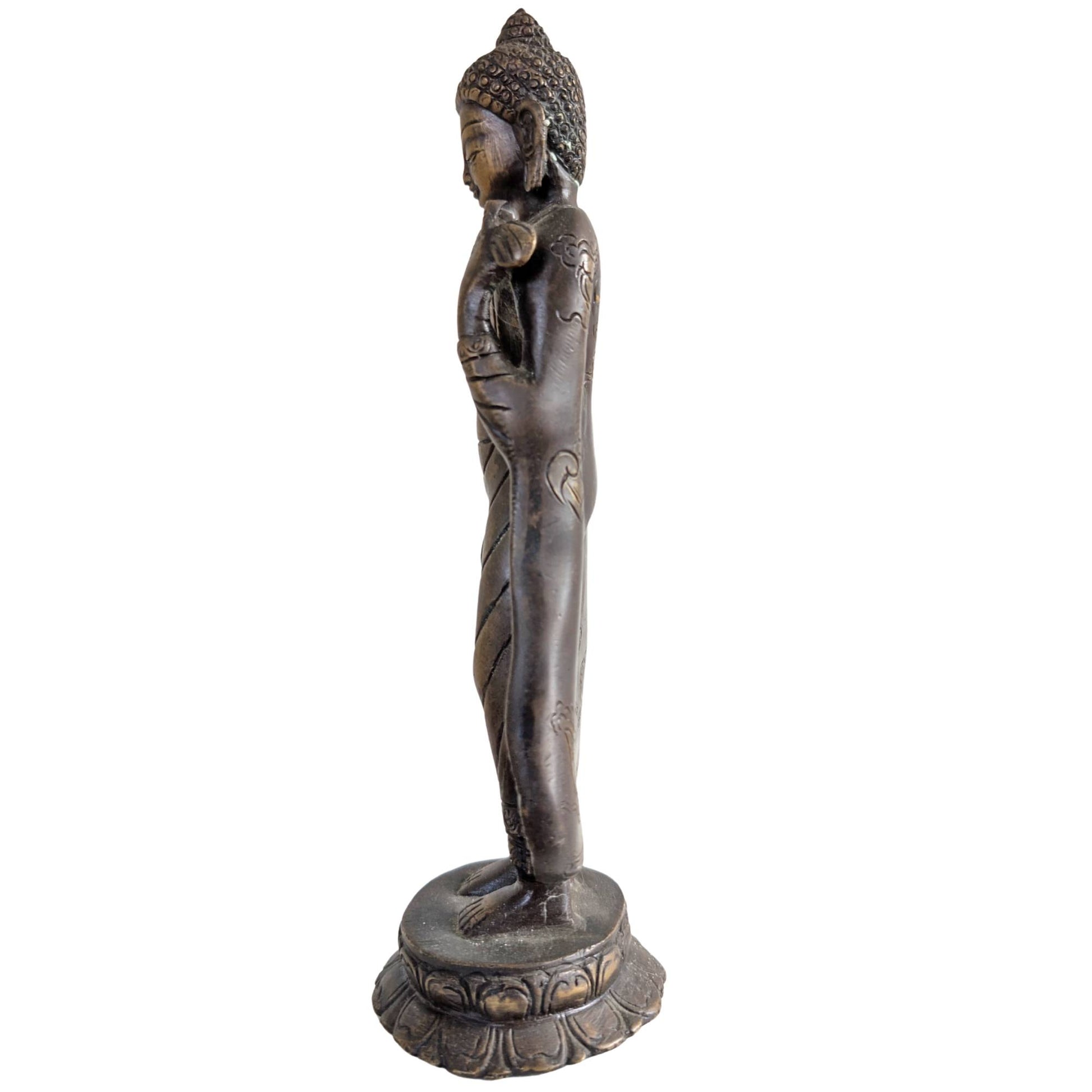 Back of the statue with engraved good luck symbols from the Nepalese tradition.