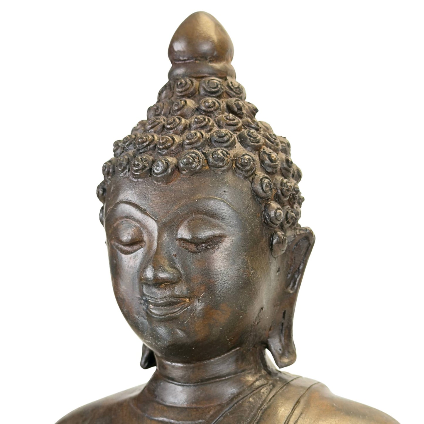 Rear view of the Buddha showing the traditional robe lines.