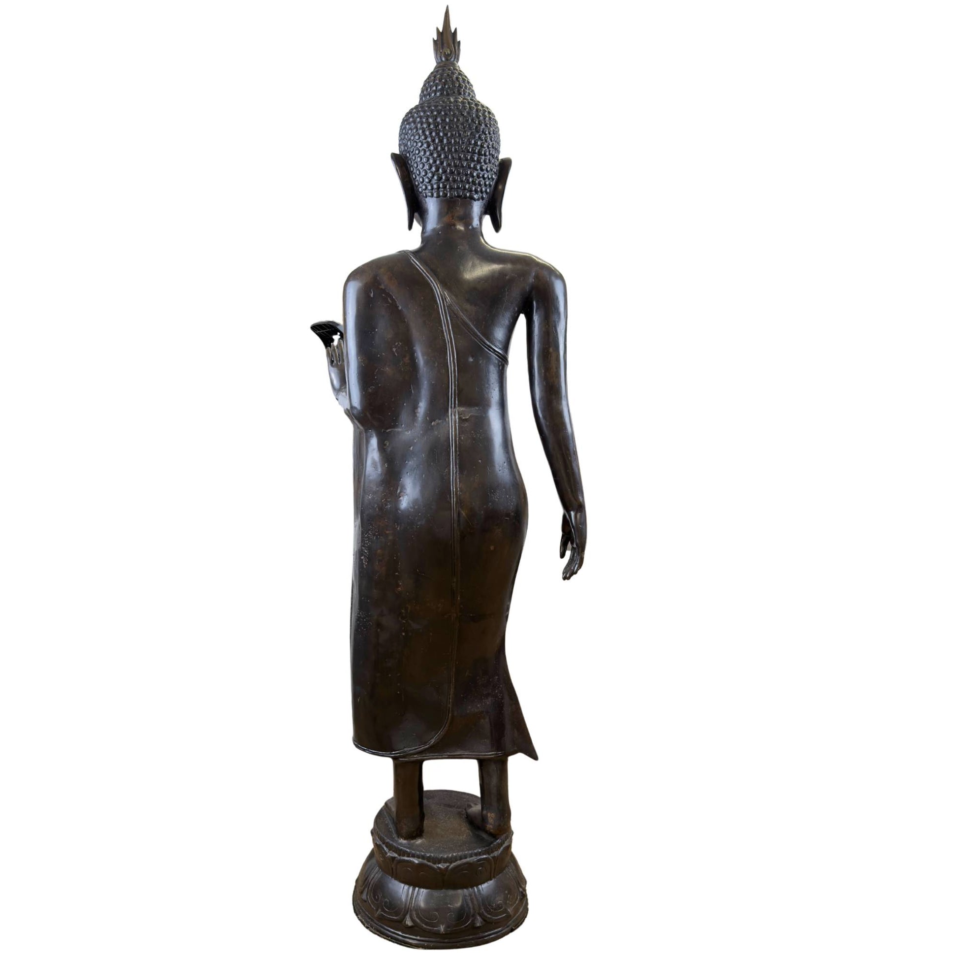 Back view of life-size bronze Sukhothai Buddha