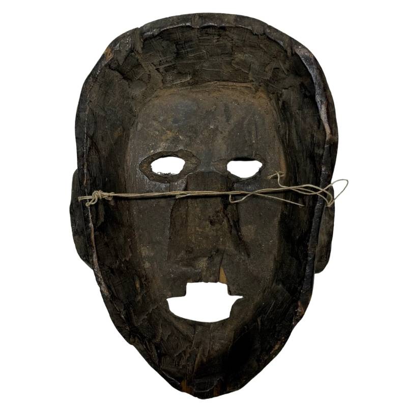 The hand-carved interior of the wooden 400g lightweight Himalayan mask with a verified, oily, mirror-smooth wearing patina.