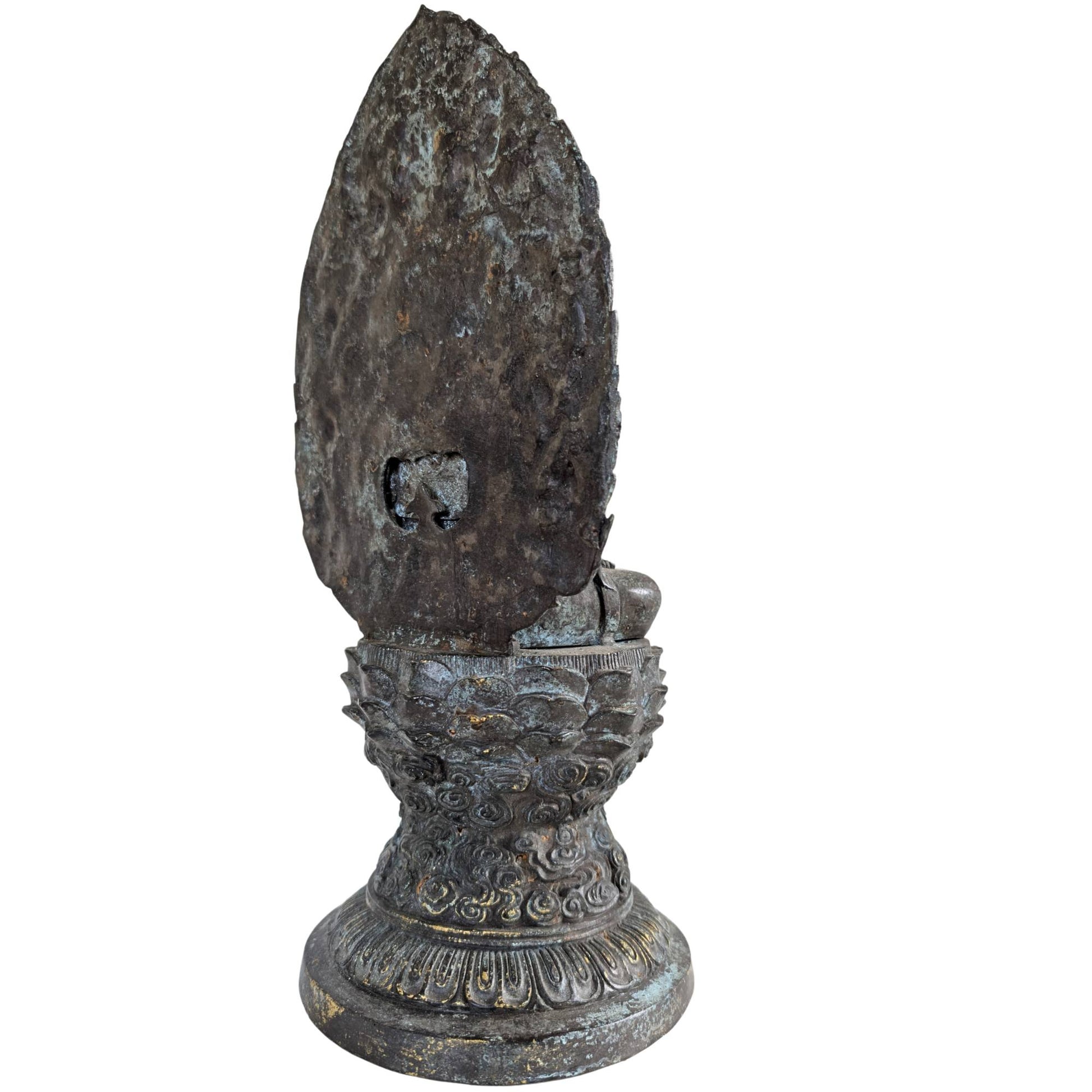 Rear view of the large flame-shaped mandorla with authentic patina and casting marks.