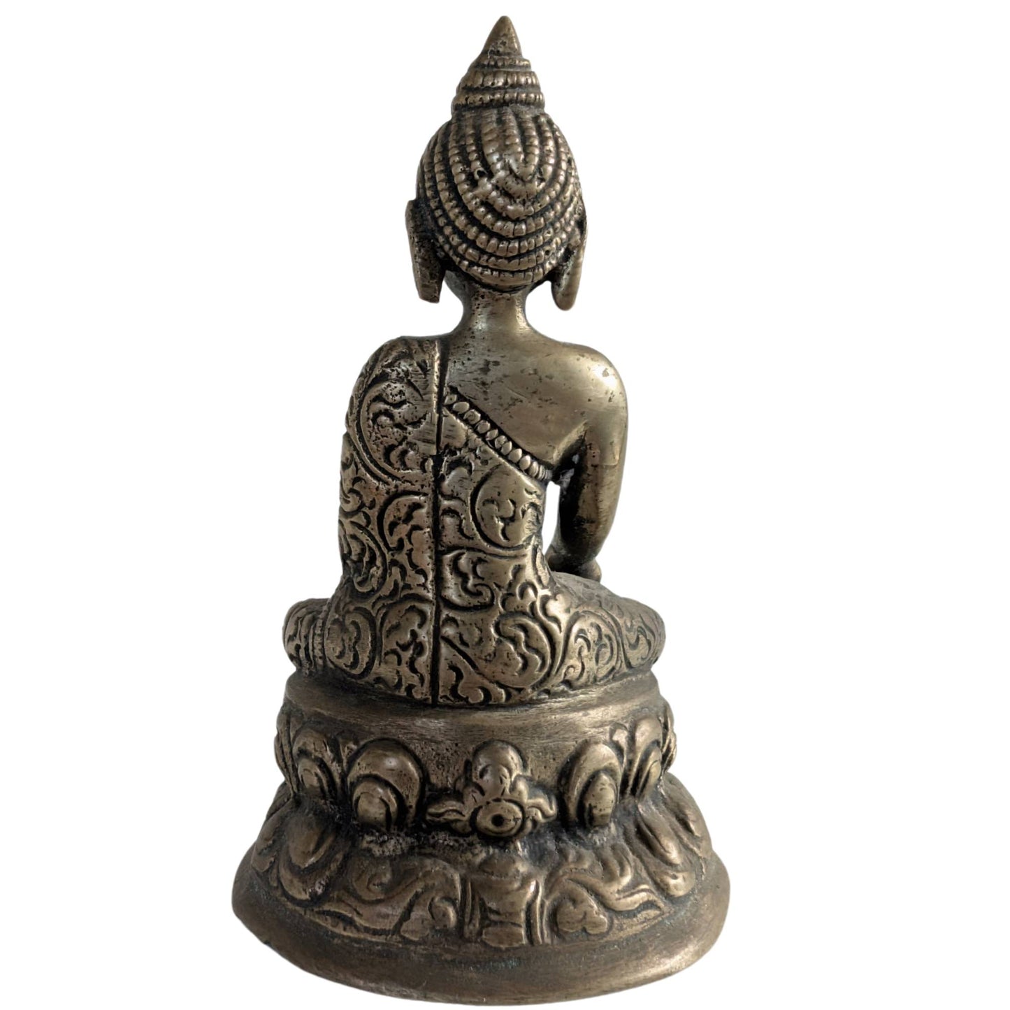 Back of the small brass Buddha figurine with engraved details.