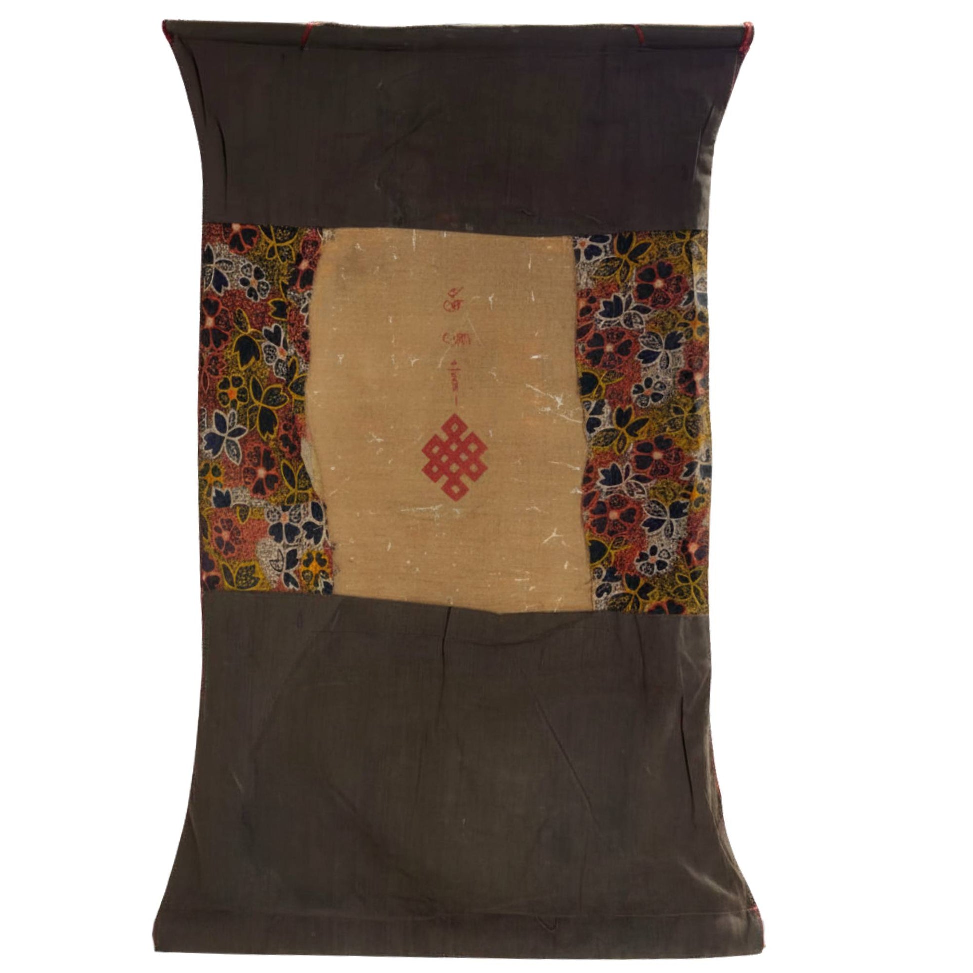 Back of the vintage thangka with a hand-painted red Endless Knot and Tibetan initiation.