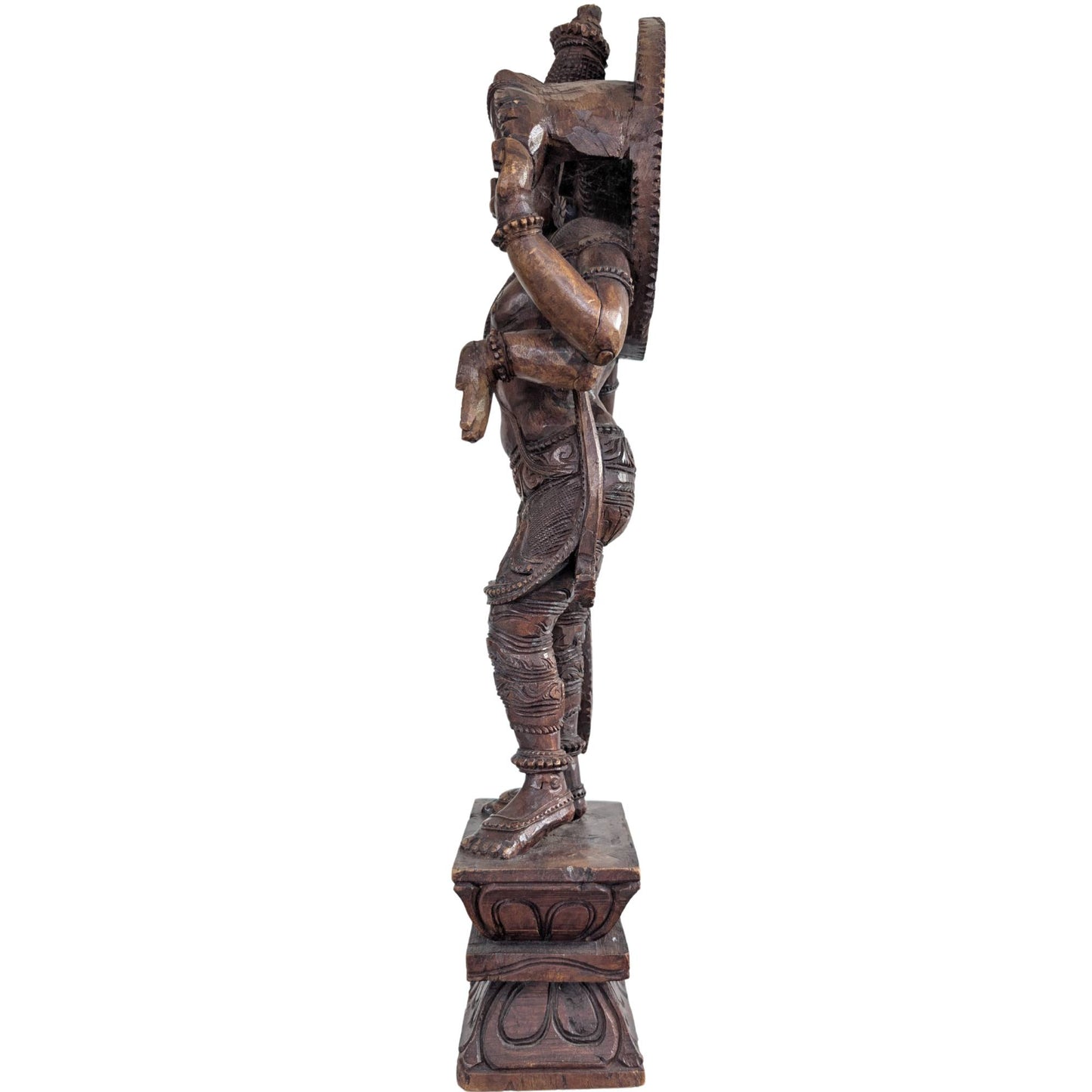 Rear view of the worked halo on the wooden sculpture.
