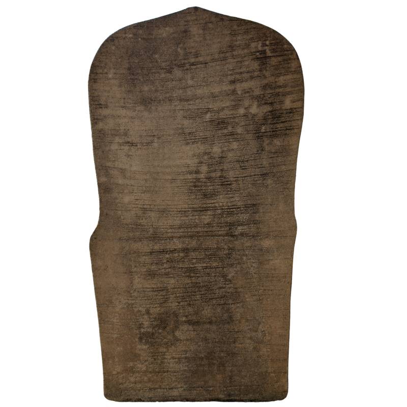 Back of monolithic hand-carved sandstone statue