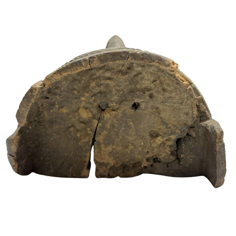 Authentic African wooden mask with visible wear and patina
