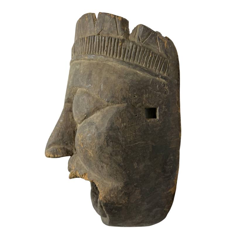 African wooden ceremonial mask with signs of use and patina