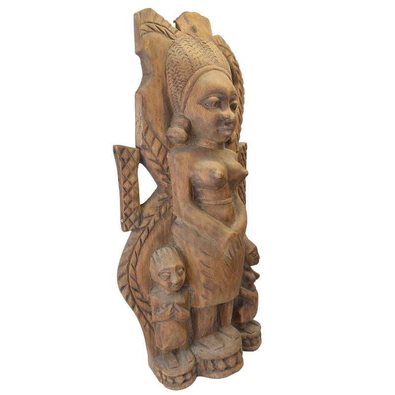 Handmade African woodcarving with a motherhood scene