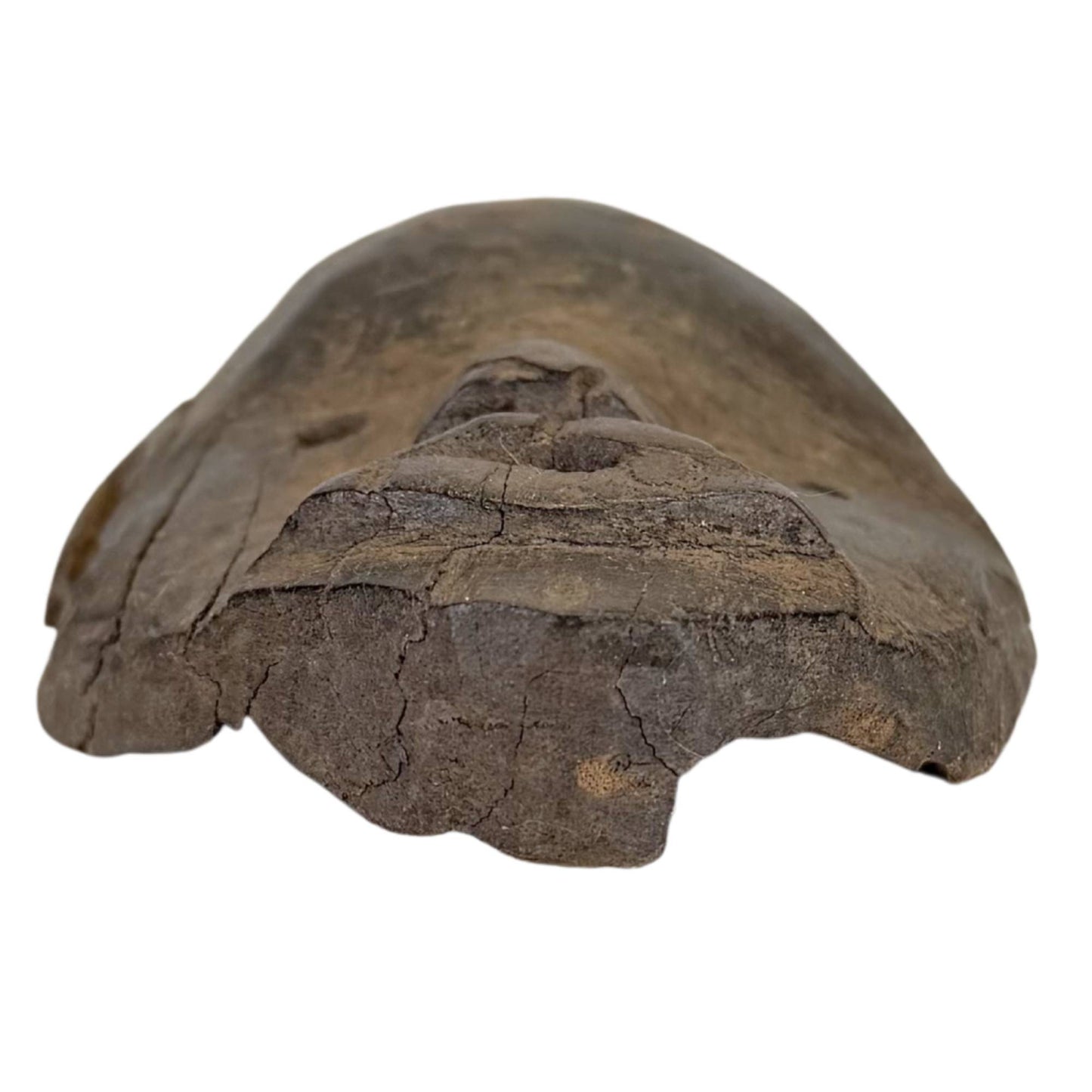 African wooden mask with open mouth and deep eye openings