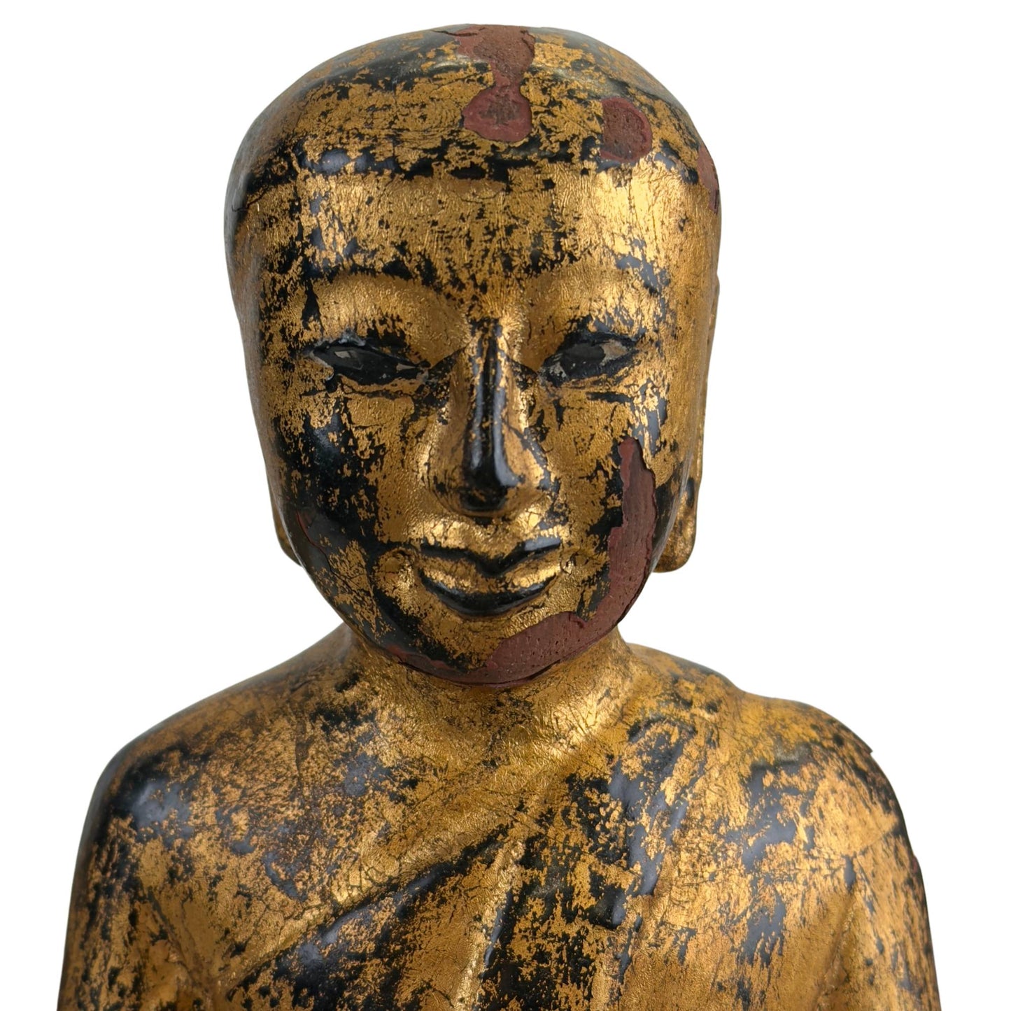 Close-up of the Anjali Mudra prayer pose with gold leaf finish