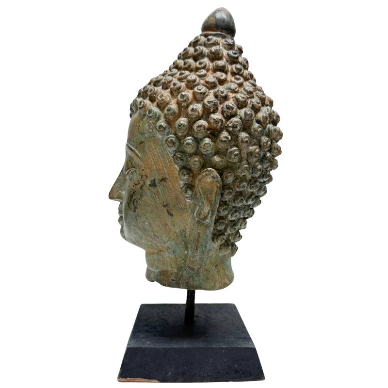 Antique Asian bronze Buddha head with refined hair texture