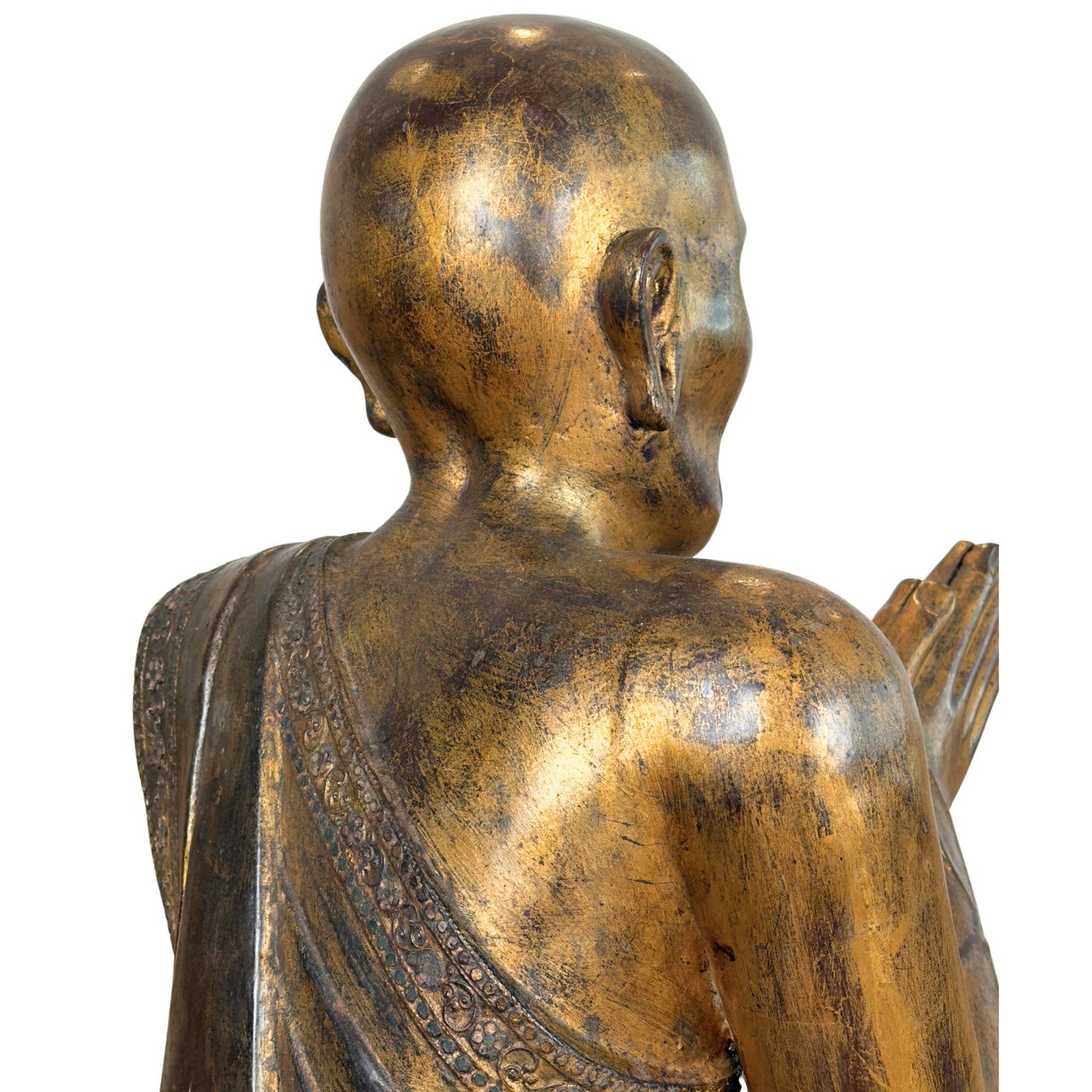 Skull side and right shoulder of the Burmese monk Sariputta with dark thit-si lacquer patina and worn gold leaf.