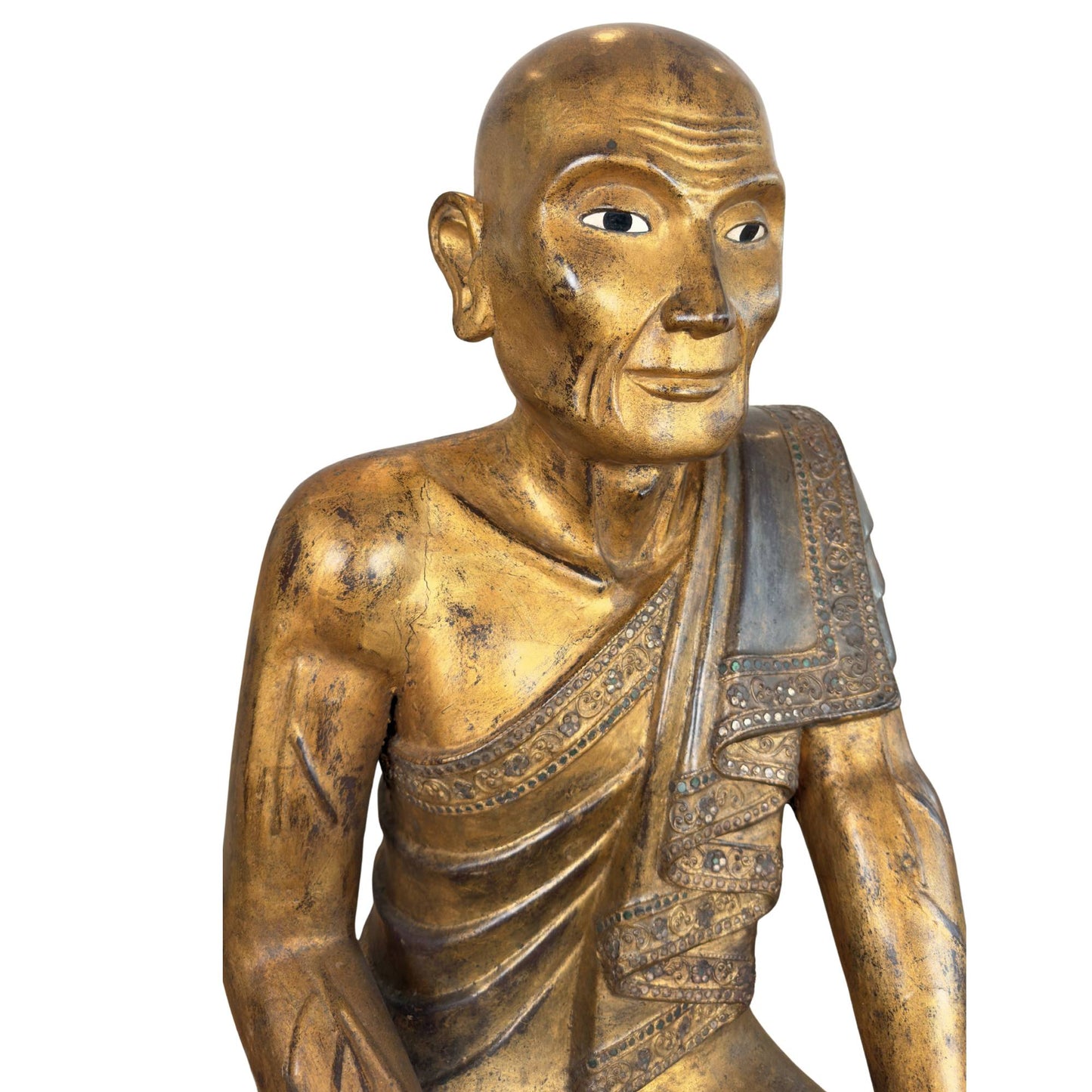 Burmese monk Sariputta of gilded wood with facial wrinkles and hmankazi mirror glass inlay on the civara robe.