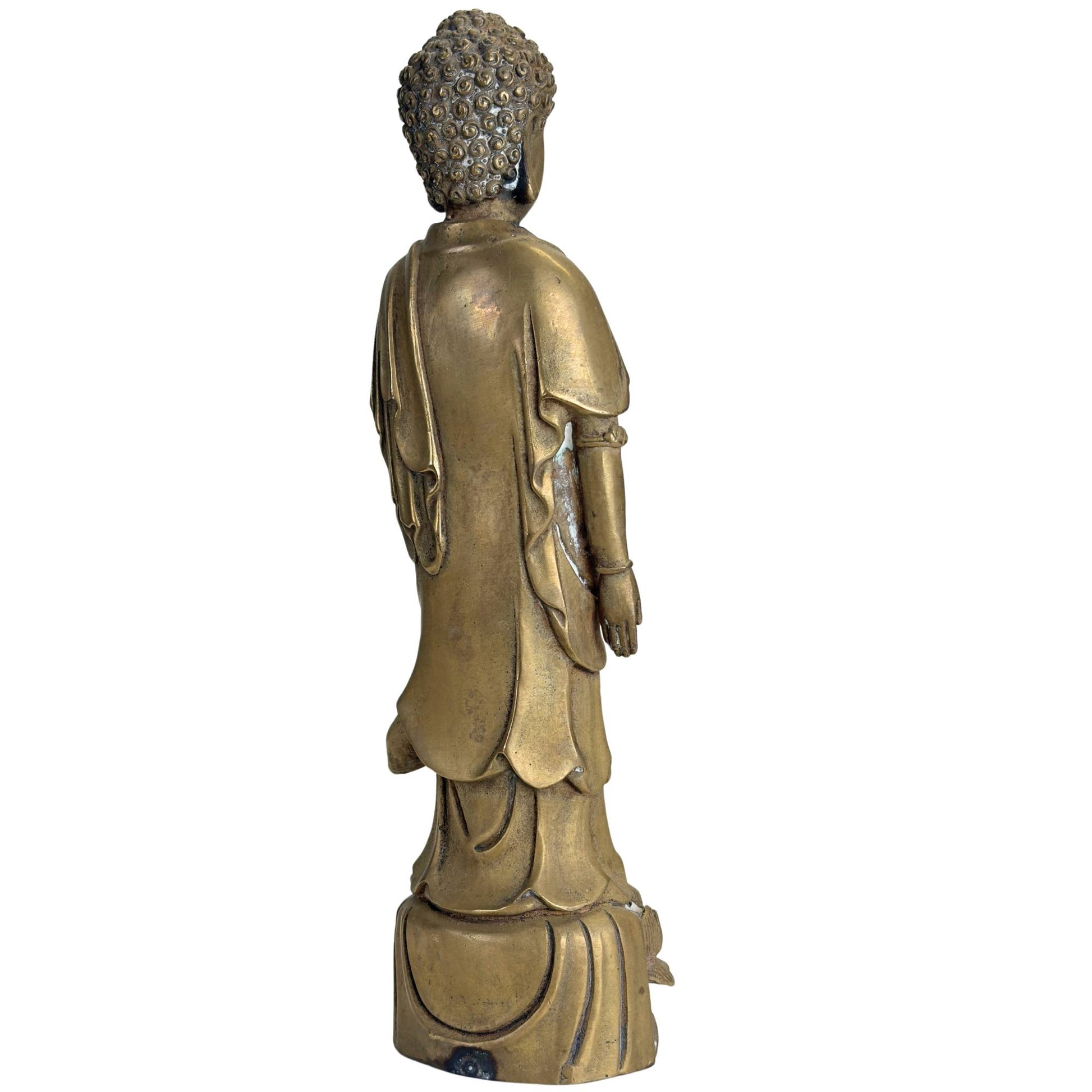 Antique bronze Buddha statue with a golden-brown patina and Qing style features