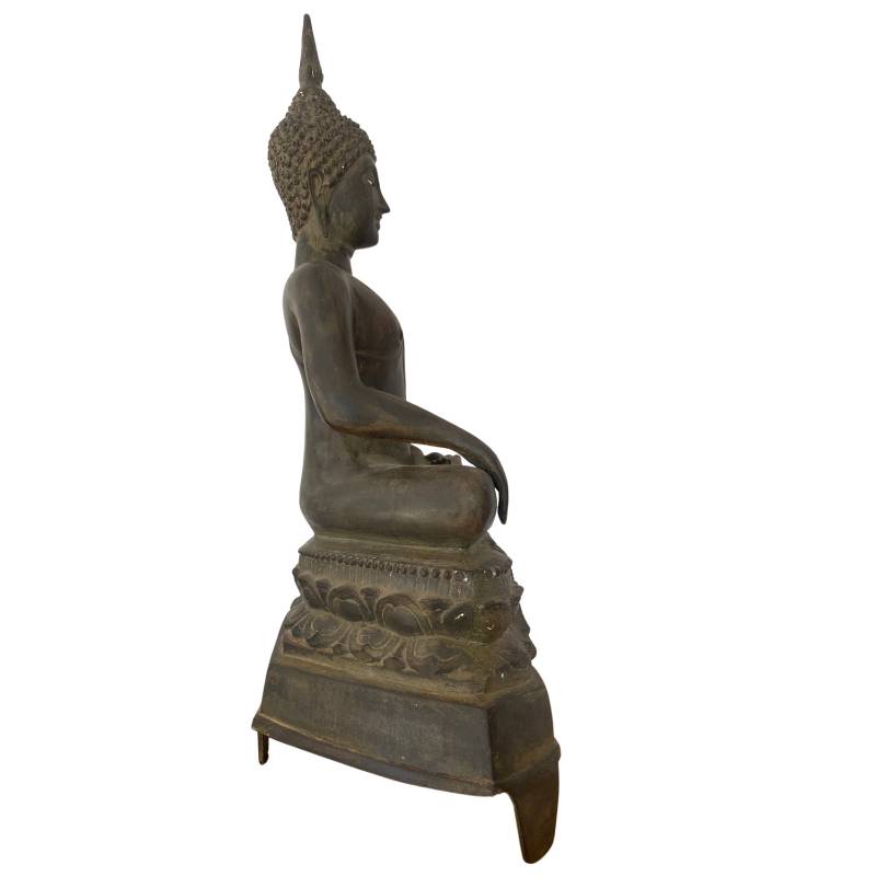 Antique Buddha statue from Thailand in traditional style