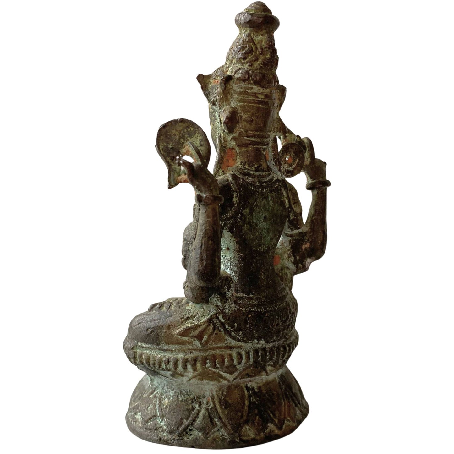 Detail of historical cuprite oxidation on antique Tibetan bronze Buddha statue