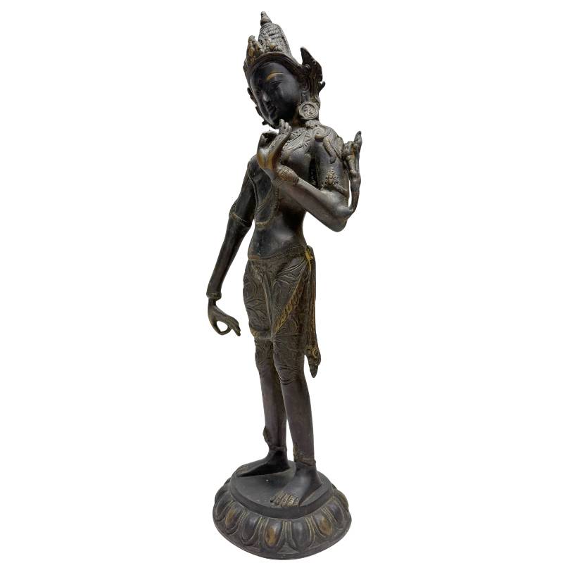Rear view of the bronze Tara sculpture with detailed robes.