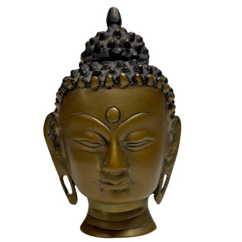 Antique bronze Buddha head with remnants of gilding