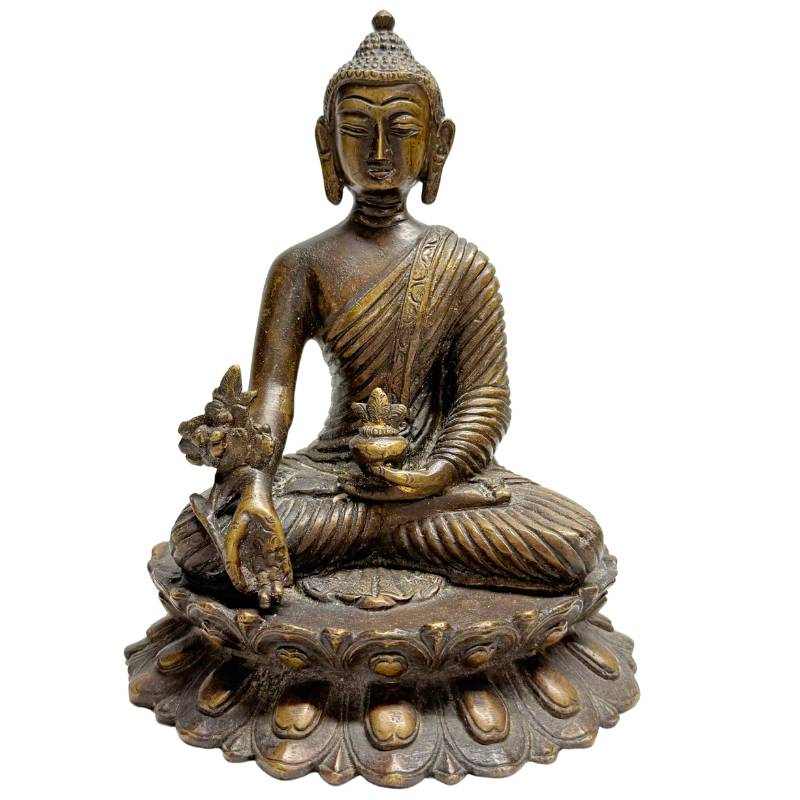 Antique bronze Buddha statue seated on a lotus throne
