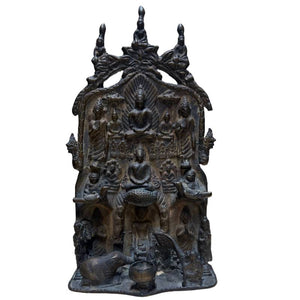 Bas-relief en bronze antique représentant le Bouddha Mucalinda – Style himalayen Inde/Népal – vers 1880-1920 – Symbole de protection et de refuge spirituel