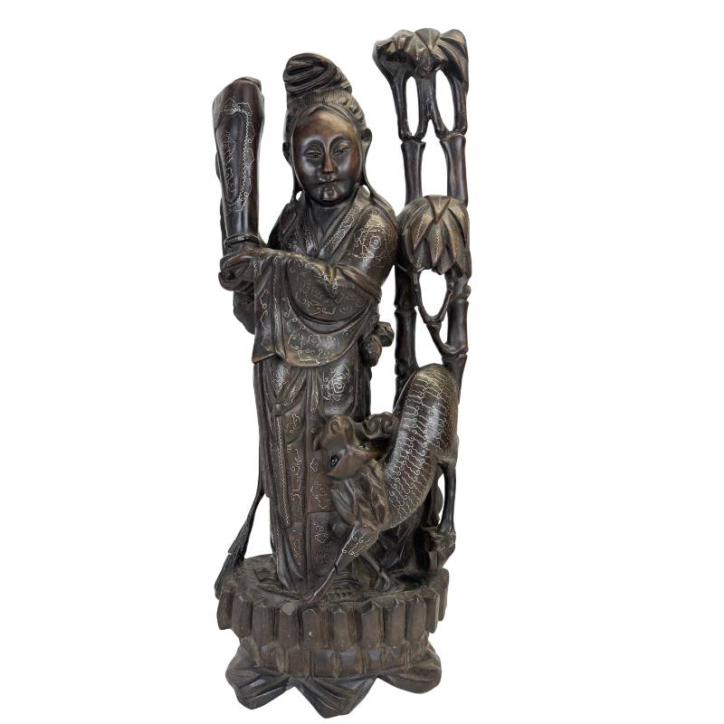 Antique Chinese wooden statue of a Magu with detailed silver inlay, 19th century.