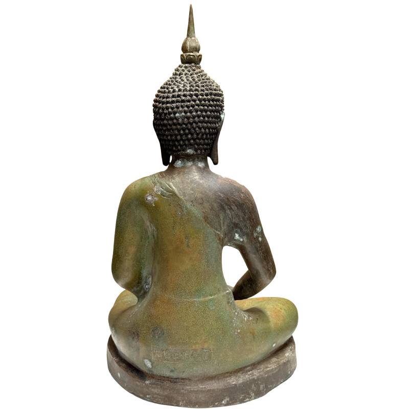 Antique Chinese Buddha statue in bronze with a historical appearance