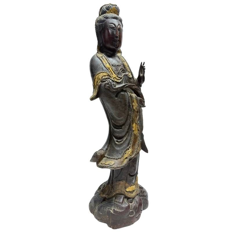 Antique Chinese wooden Guanyin statue with remnants of gold leaf