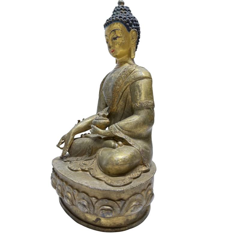 Antique Himalayan bronze Buddha statue with fire-gilded surface