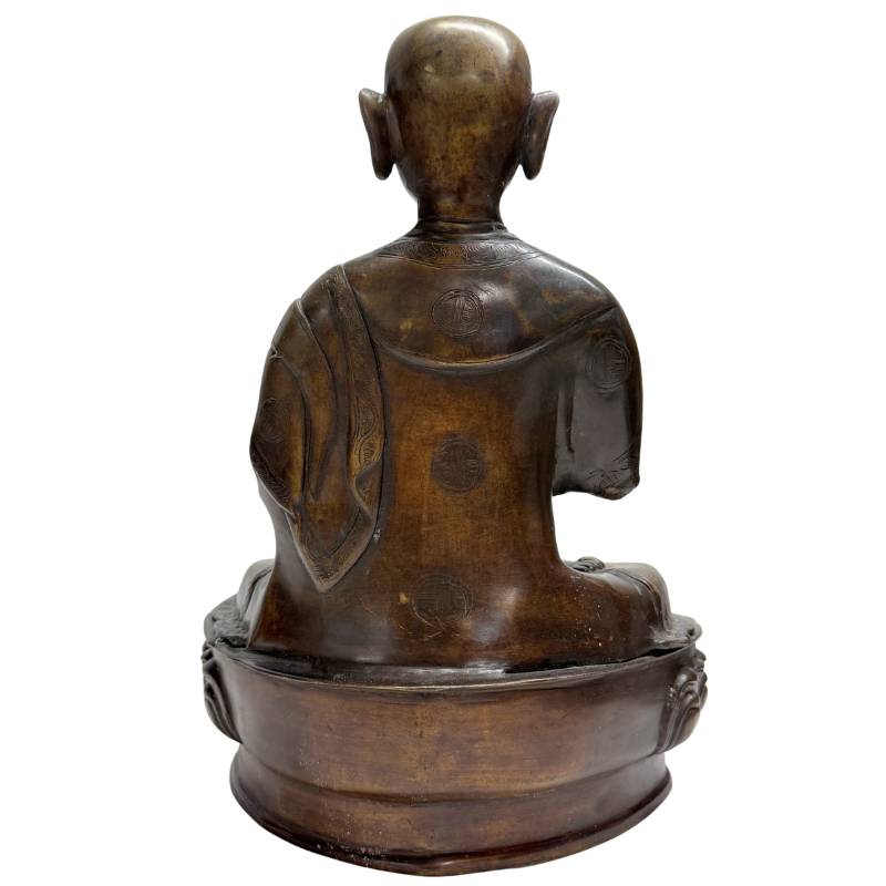 Antique Himalayan llama statue in bronze